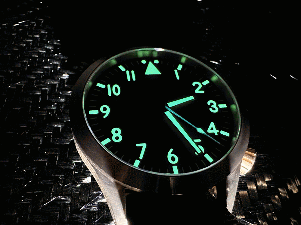 This titanium field watch has a superlative night lume that glows