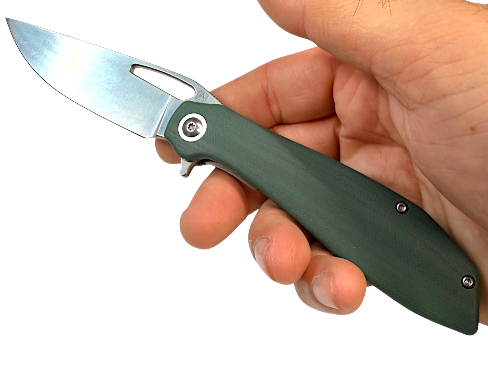 CountyComm BXTR folding knife with a semi-polished 8Cr13MoV steel blade and green G10 handle, held in a hand.