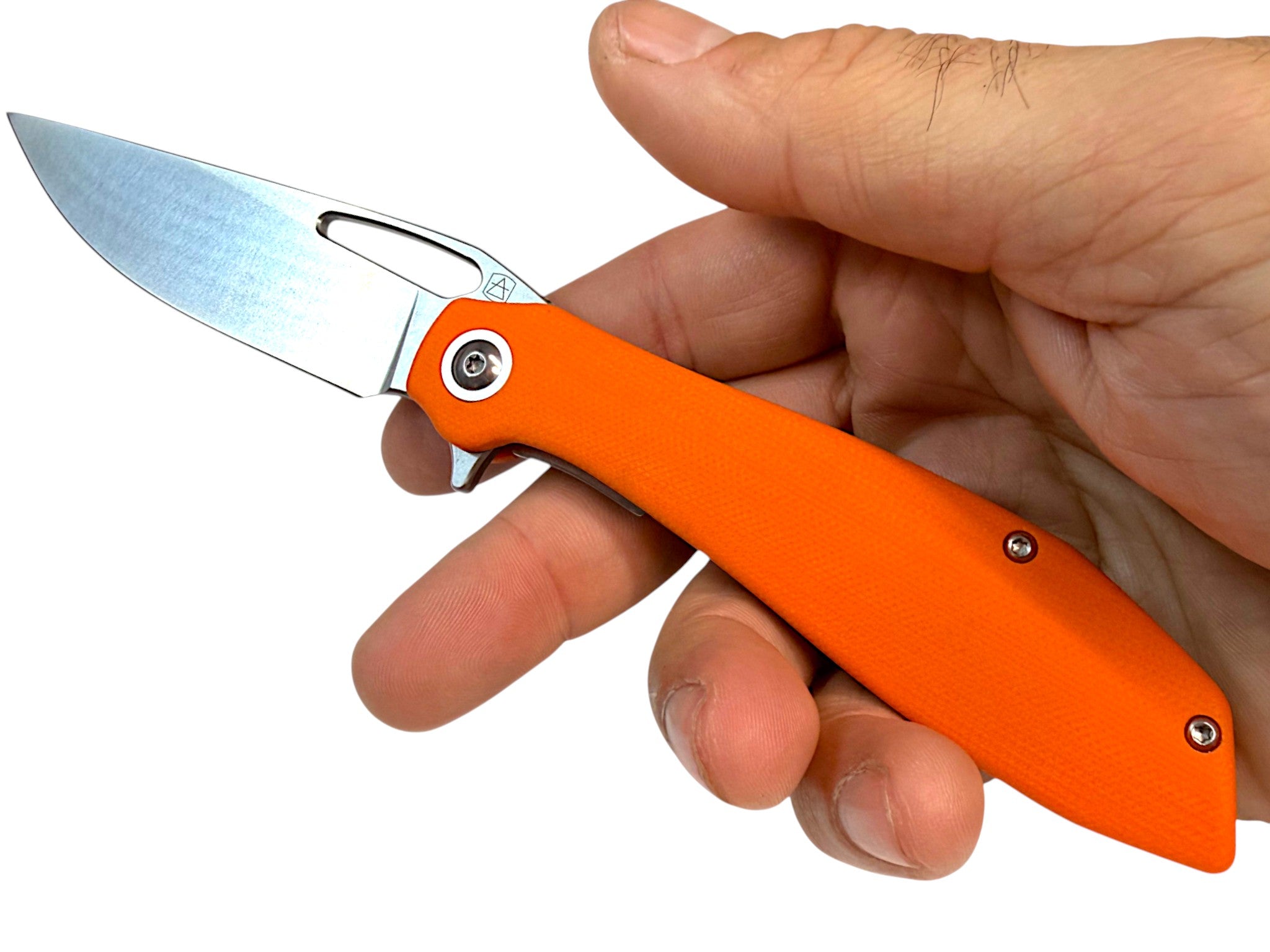CountyComm Exclusive BXTR folding knife with orange G10 handle and semi-polished 8Cr13MoV steel blade held in hand.
