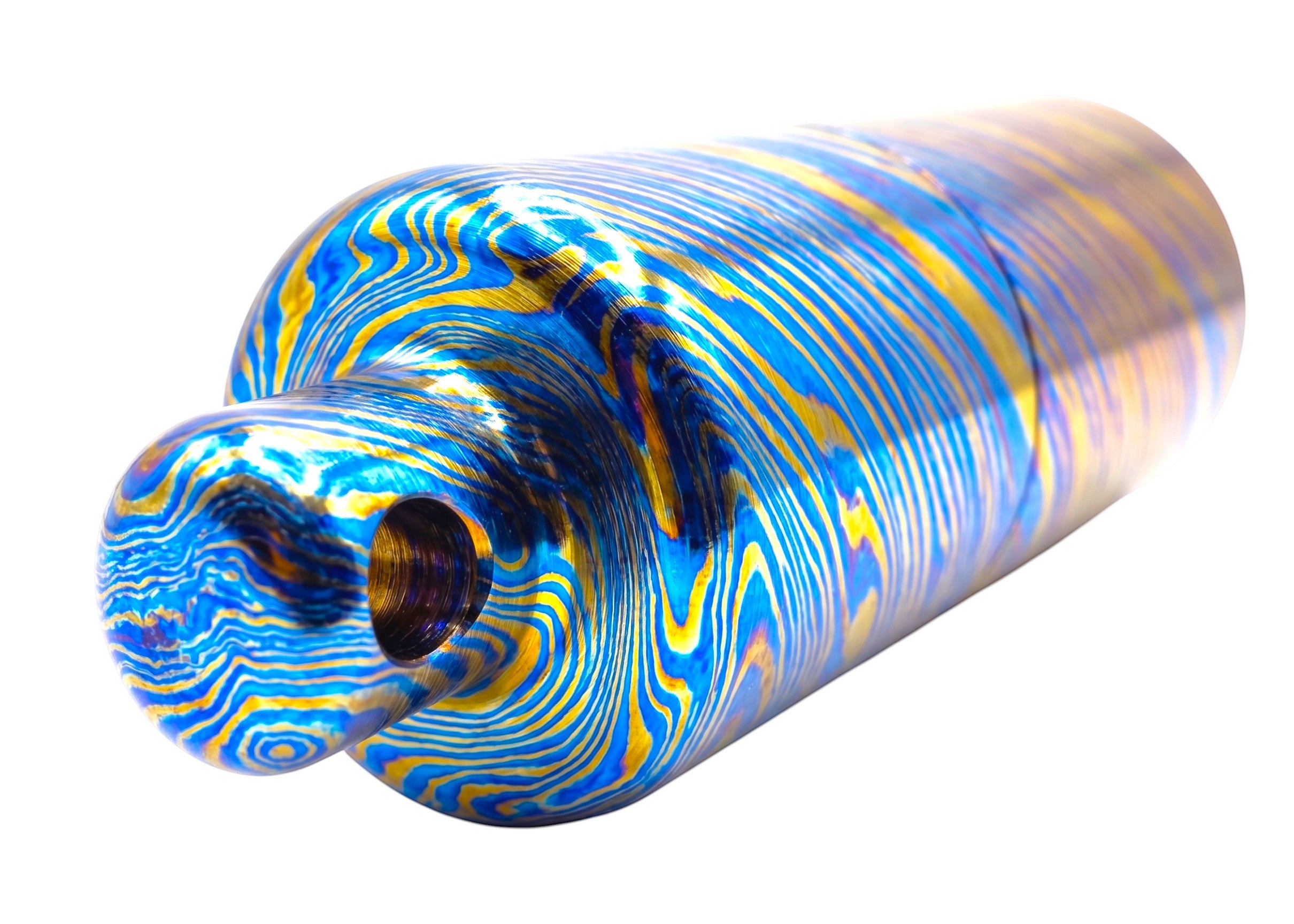 CountyComm Timascus Titanium XL Lighter with blue and gold swirling patterns. Features a removable brass insert.